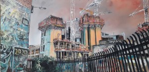 Building site with scaffolding. Red sky. Graffiti wall in foreground.